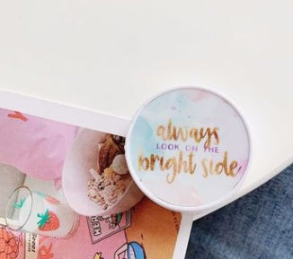 Folding phone holder